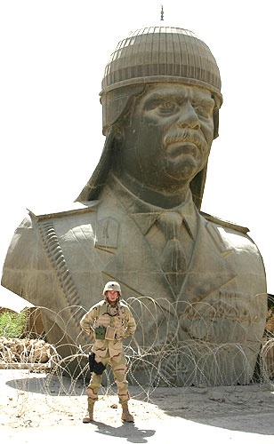Charlie Westgate in front of Sadam's Bust